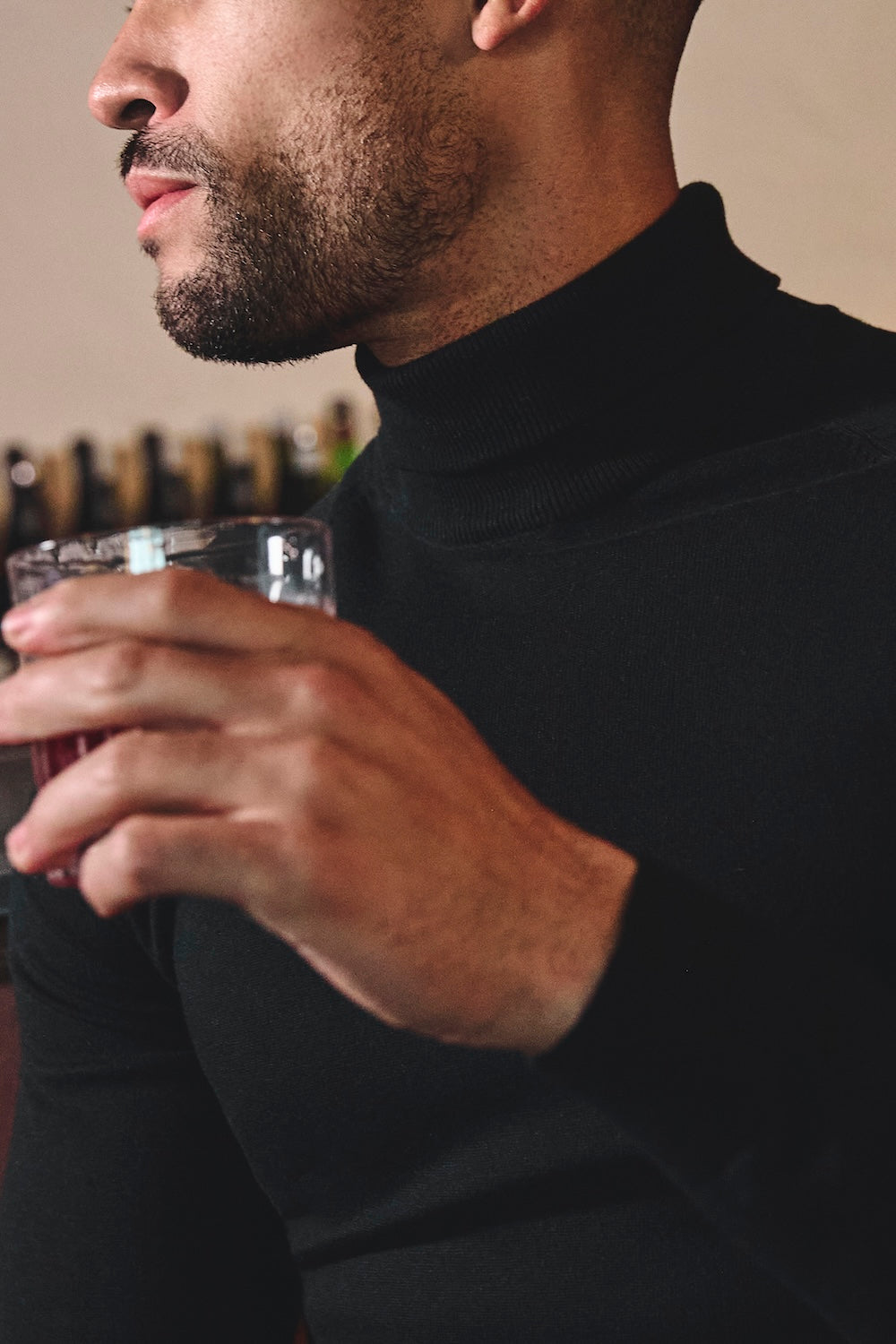 Cotton Blend Roll Neck Sweater in Black