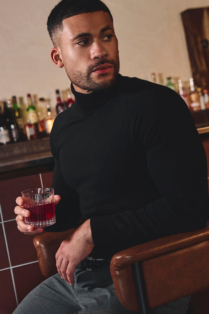 Cotton Blend Roll Neck Sweater in Black