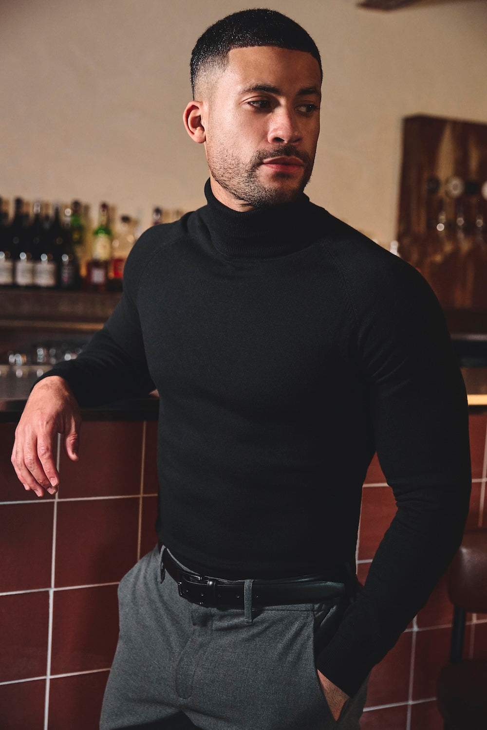 Cotton Blend Roll Neck Sweater in Black